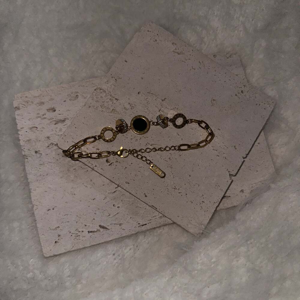 Gold overlay stainless steel bracelet with Roman numerals